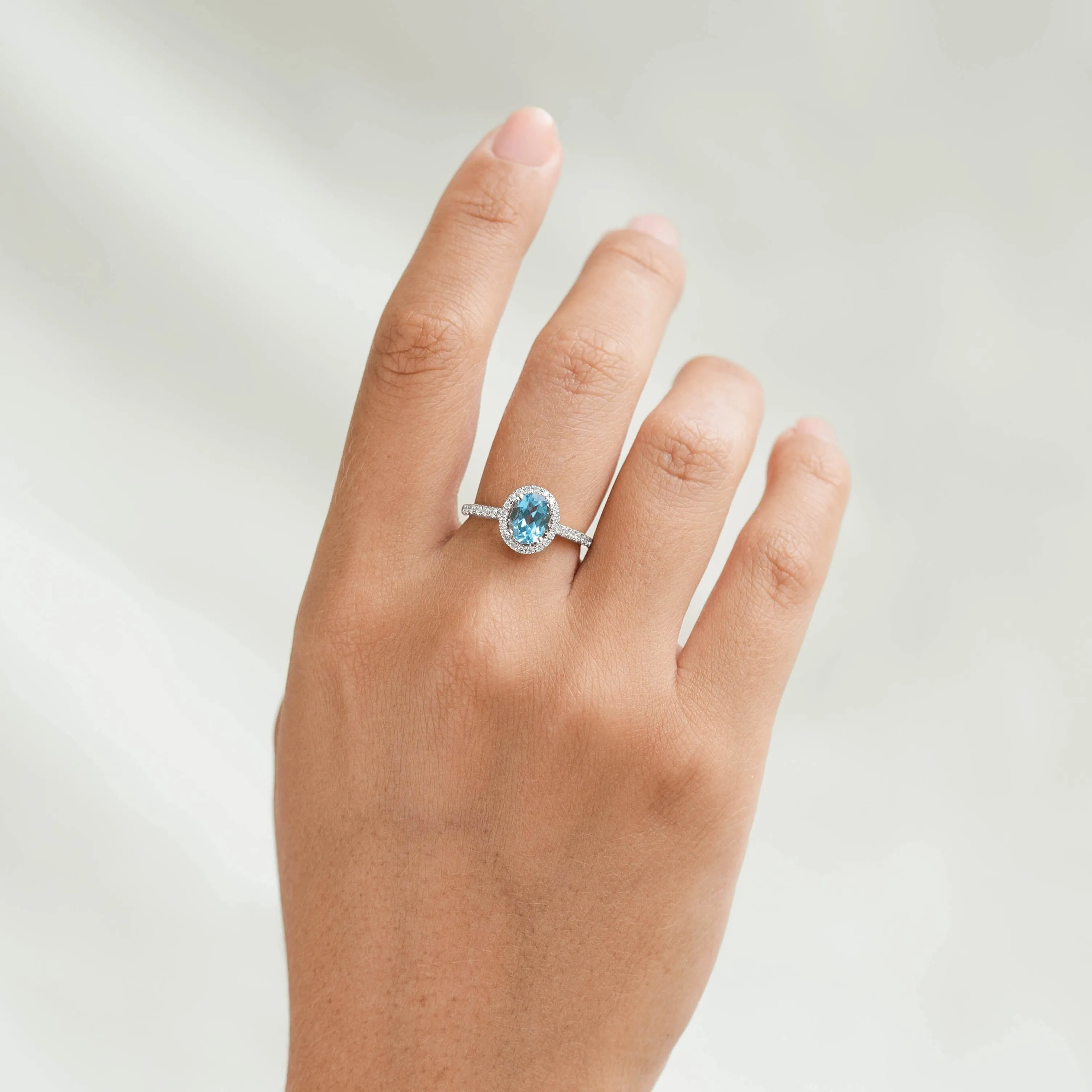 Oval Swiss Blue Topaz Halo Ring White Gold - Suna